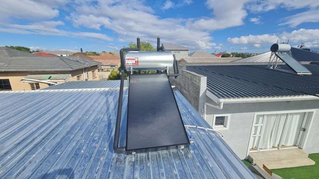 Flat plate thermosyphon system